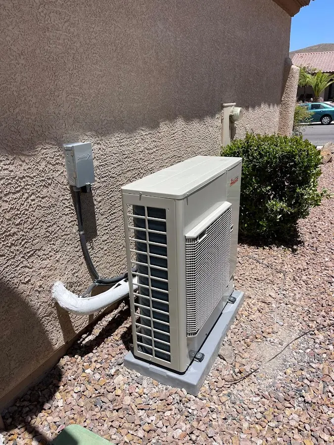 Residential air conditioning condenser unit in Pinson